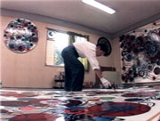 Tanaka painting in her atelier